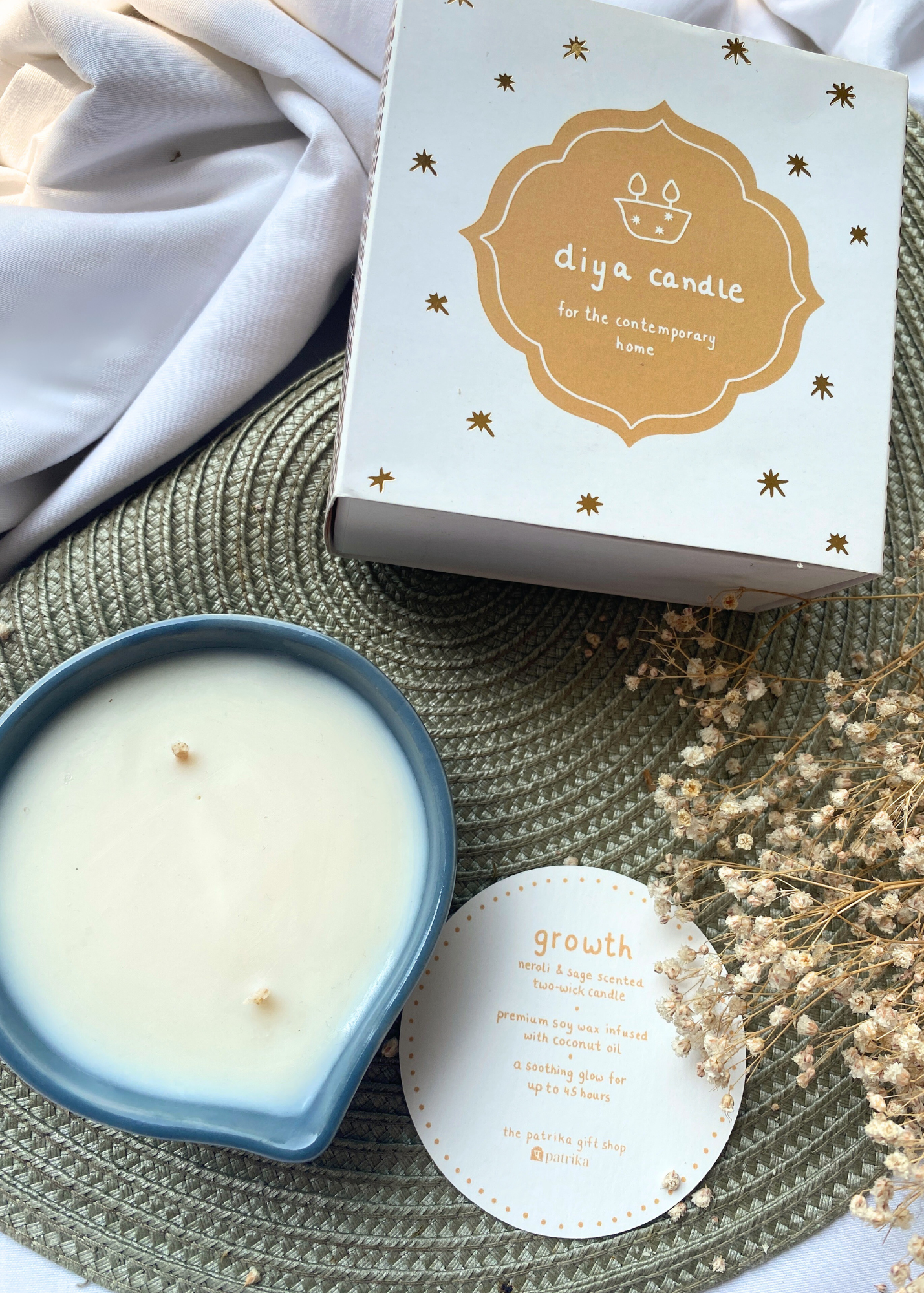 growth diya candle